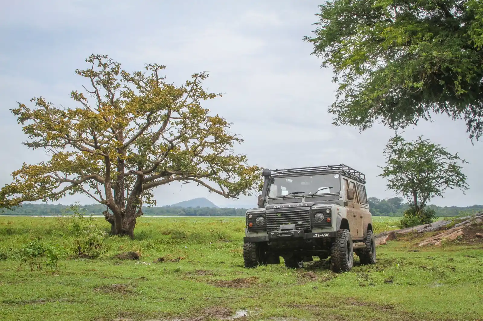 a safari jeep on the track inside Yala national park