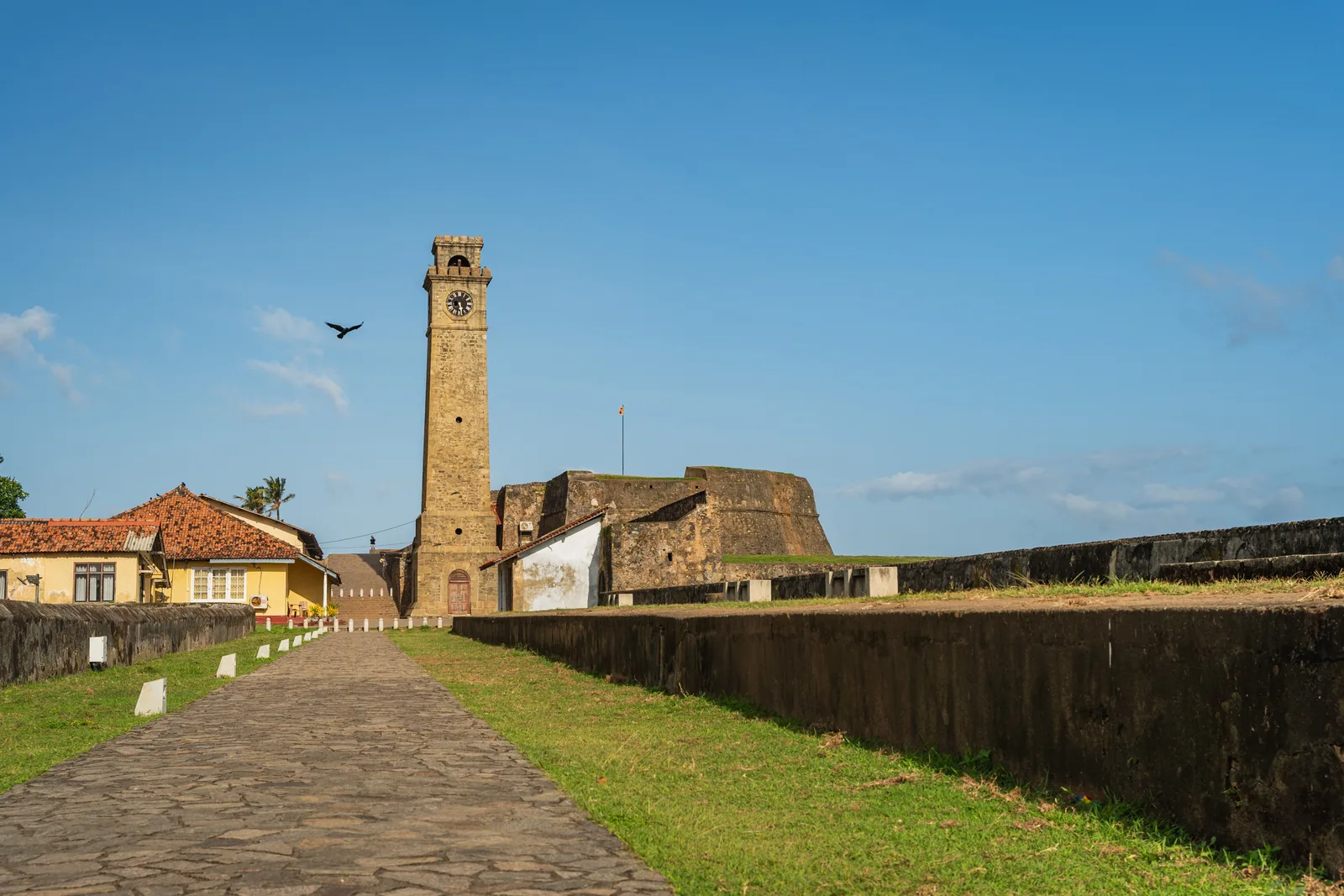 The clock tower inside Galle Fort in the late afternoon light
