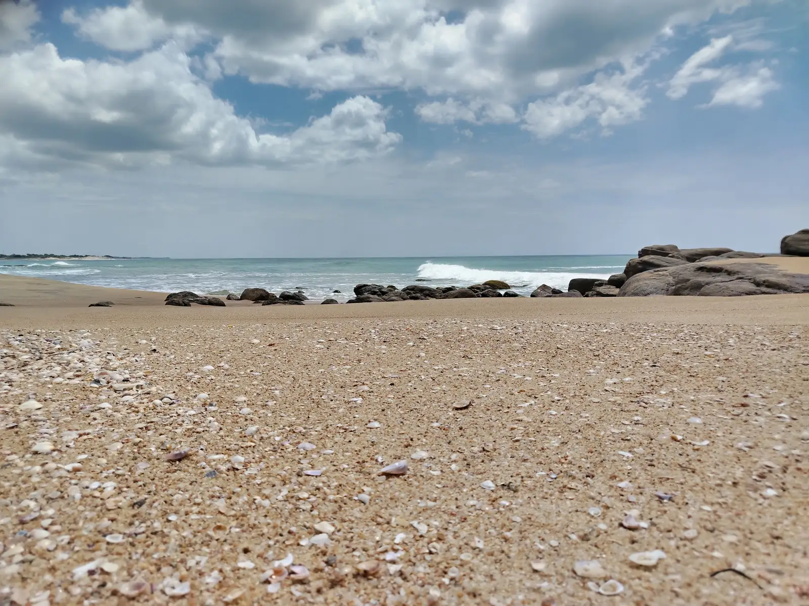 A grey afternoon sky over Pottuvil beach near Arugam Bay in July